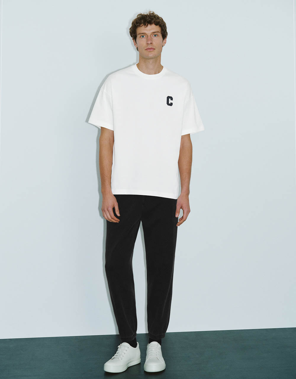 Letter Embossed Crew Neck A-Line T-Shirt