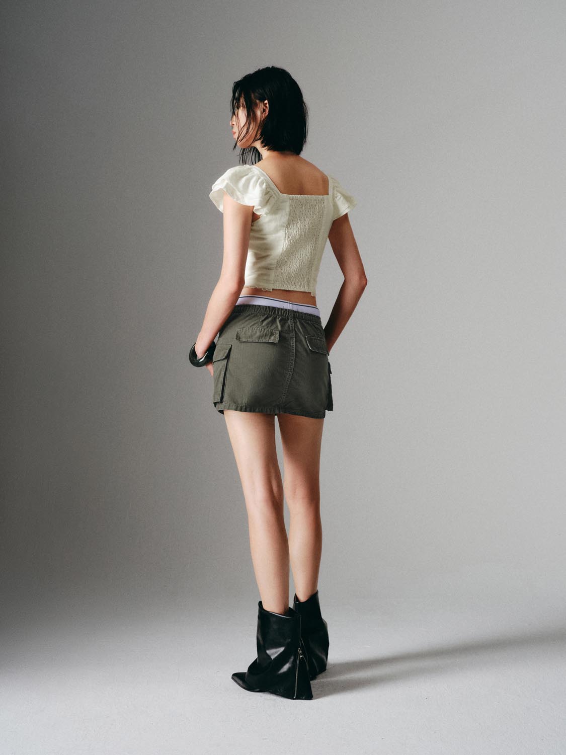 Pleated Denim Mini Skirts