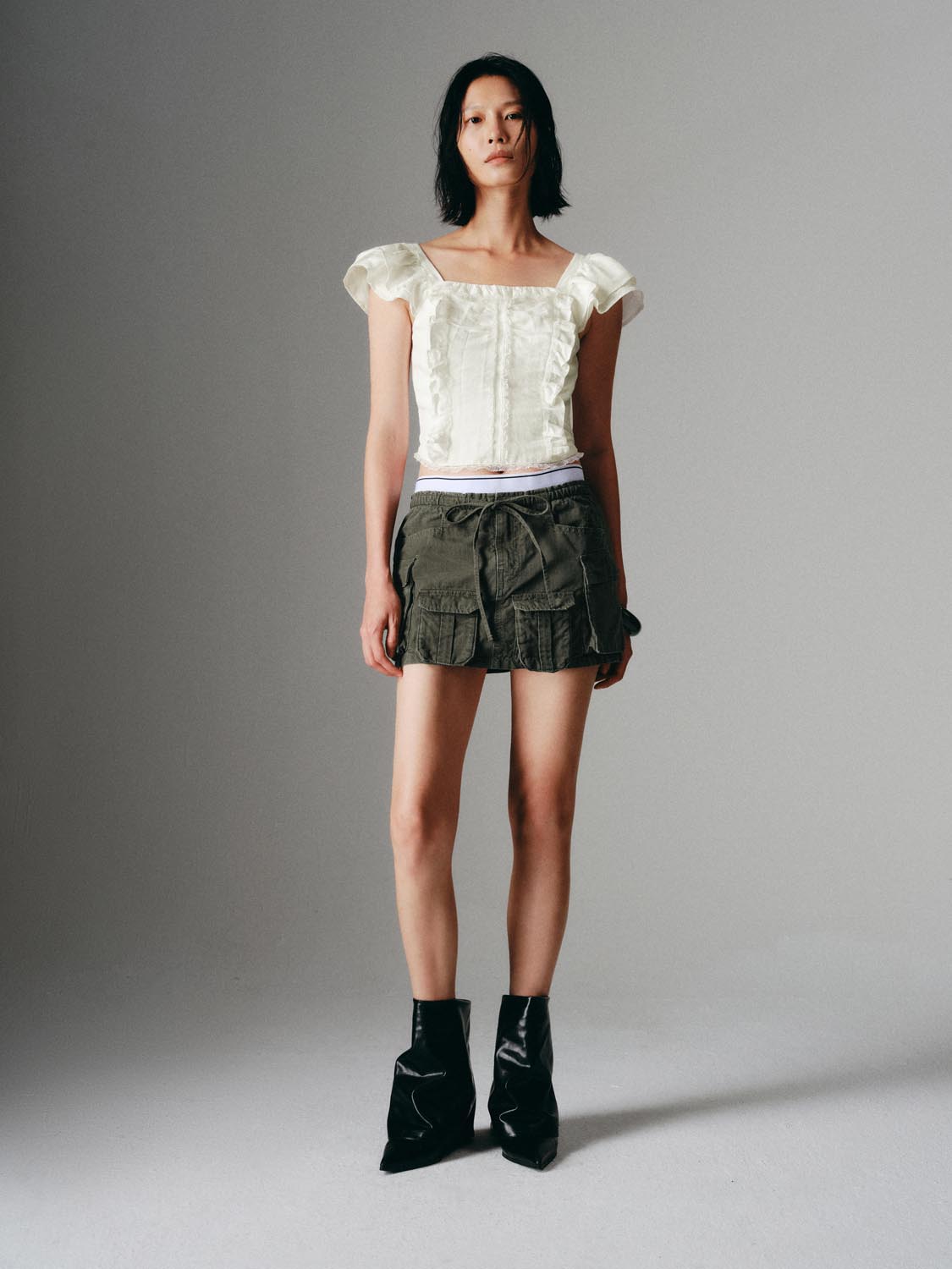Pleated Denim Mini Skirts