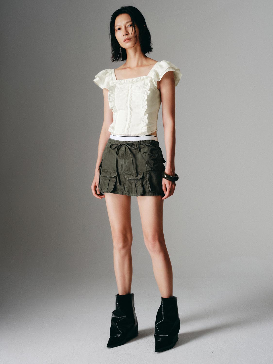Pleated Denim Mini Skirts