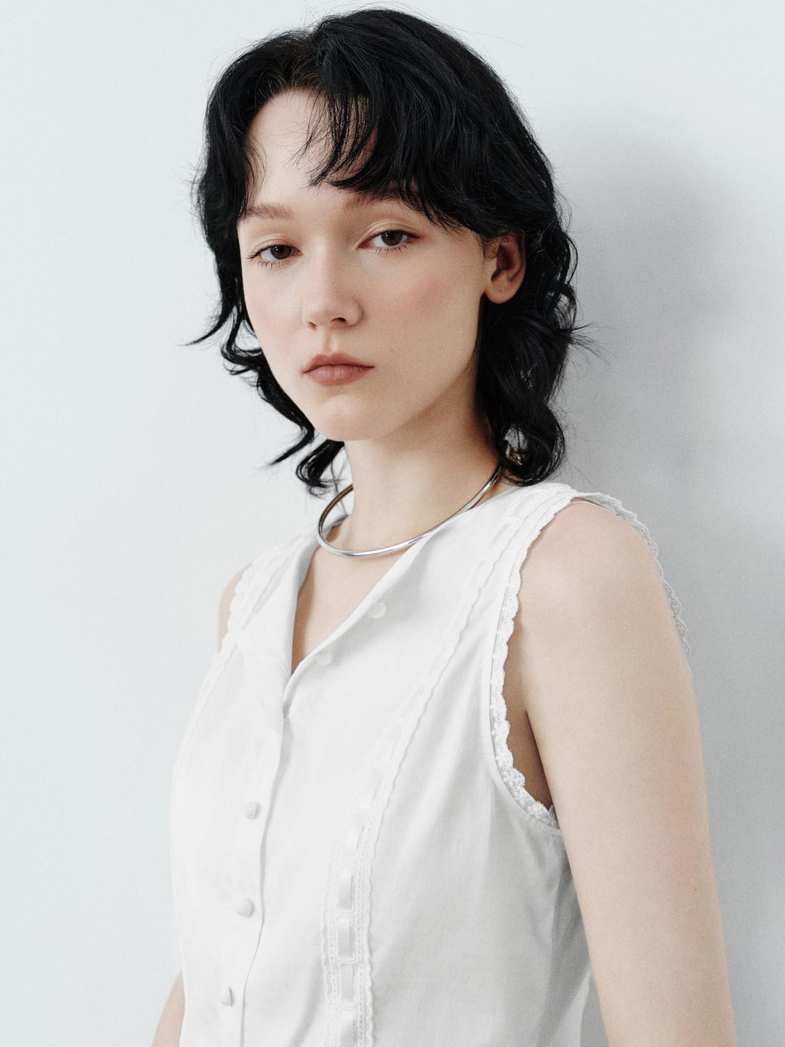 Sleeveless Ruffle Hem Shirts