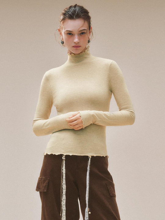 Ruffled Mock Neck Wavy Hem Long Sleeve Knit Top