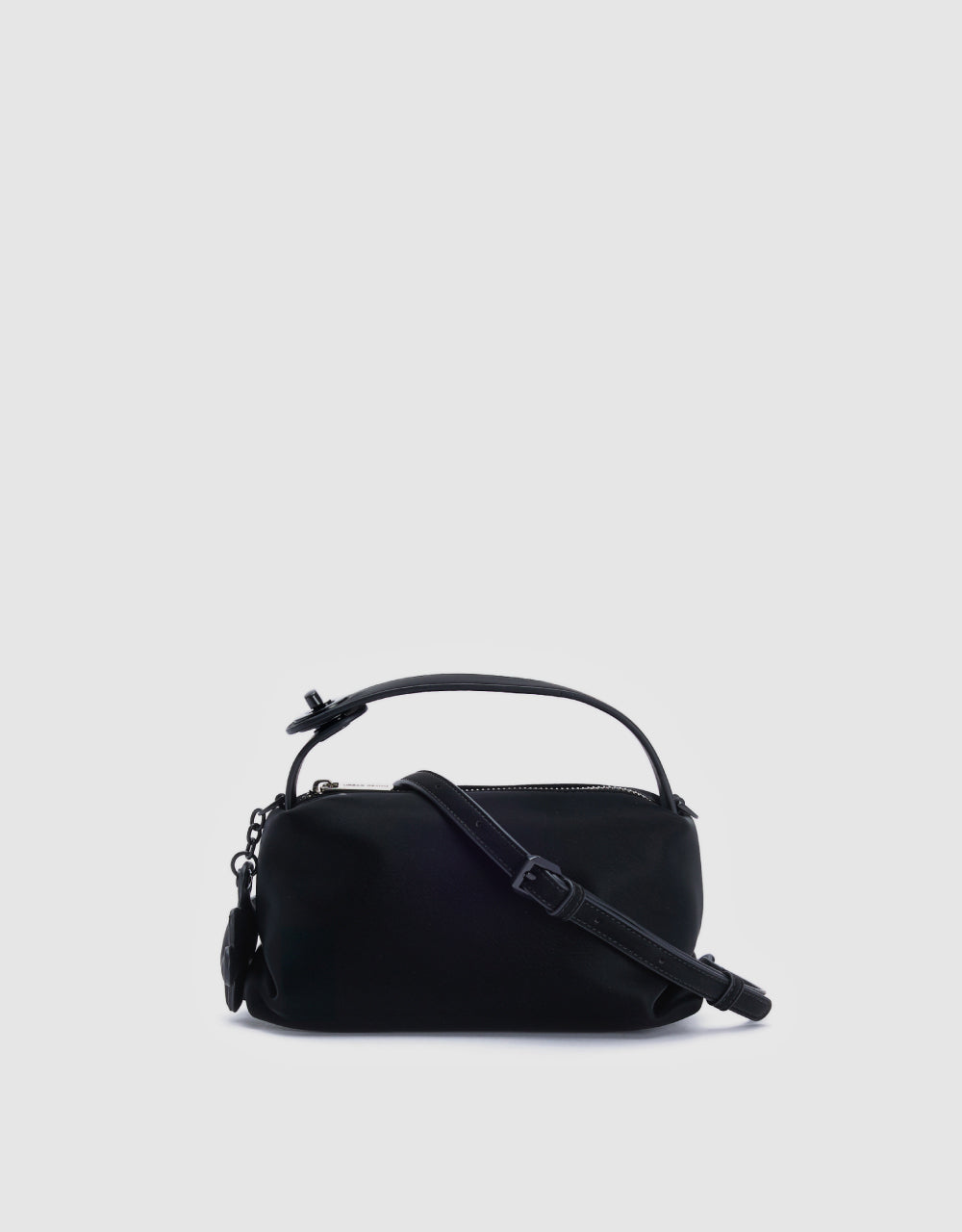 Bag With Puzzle Charm
