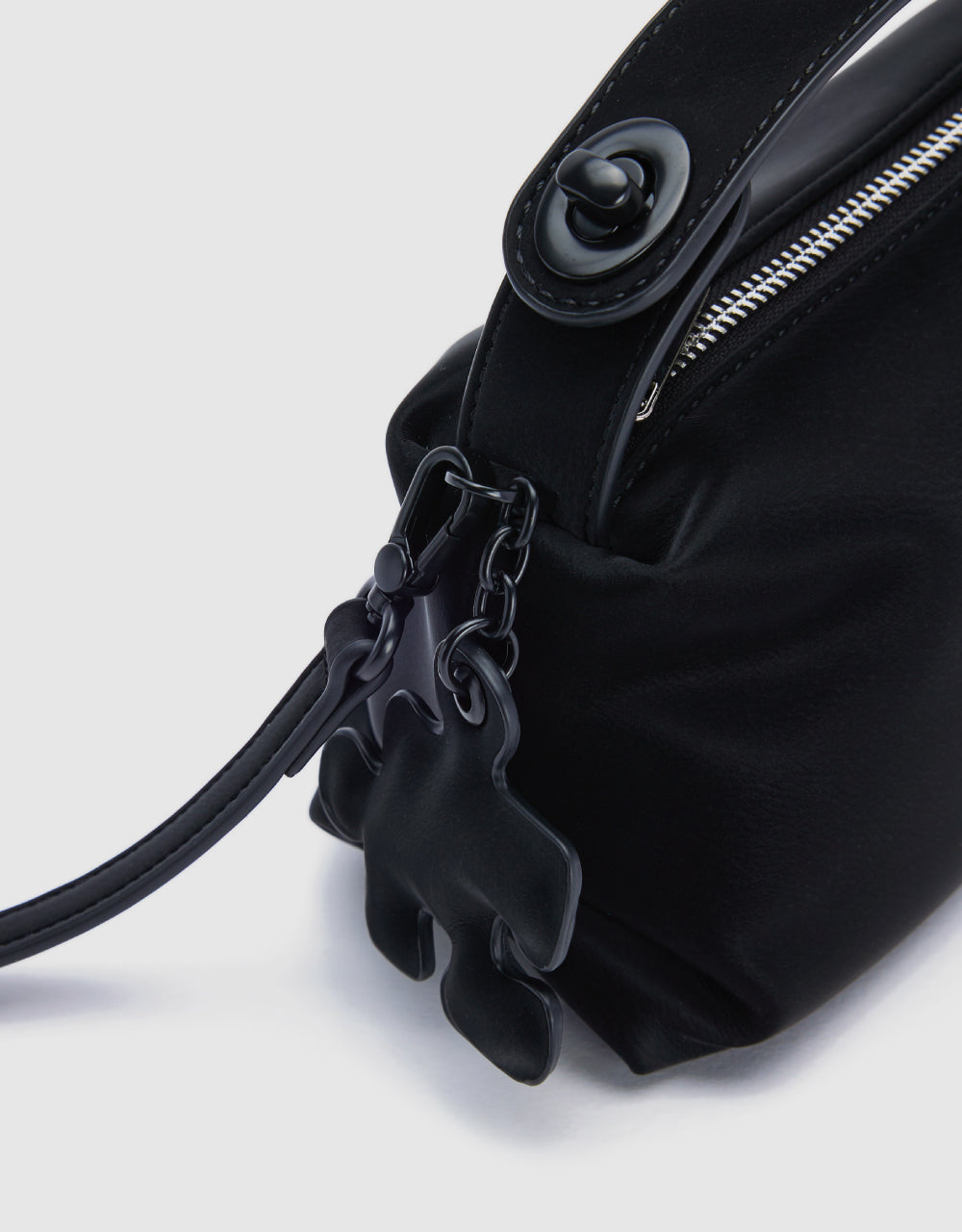 Bag With Puzzle Charm